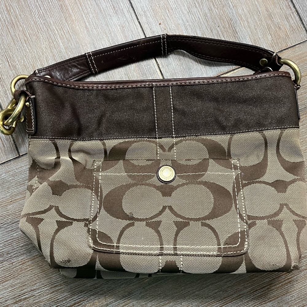 Coach Bag. Some wear and scuffs. No strap.